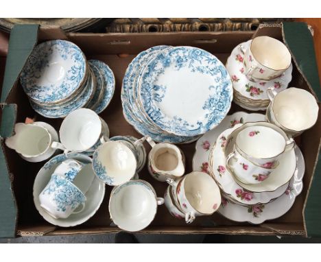 Two teasets: a pink rose and gilt teaset by Warrings, Oxford Street London, to include teacups, saucers, cake plates, milg ju