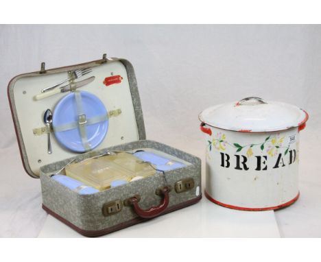 Mid 20th Century enamel bread bin, together with a cased picnic set