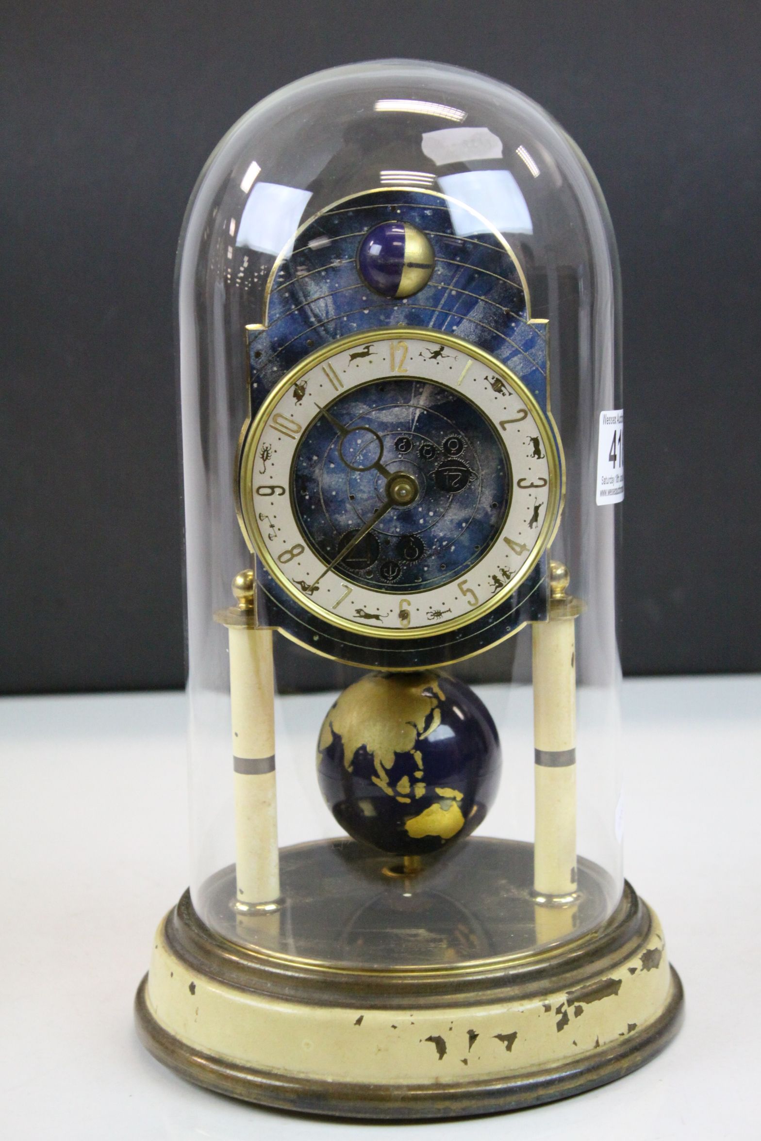 Glass dome covered Anniversary type Clock with Zodiac dial & World
