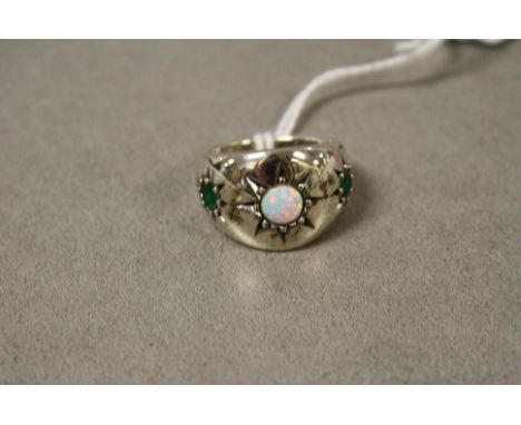 Silver ring set with opal