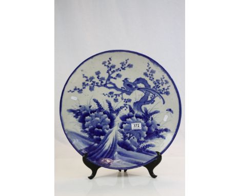 Large Oriental blue &amp; white ceramic Charger decorated with Bird on Tree in naturalistic setting &amp; stilt marks to base