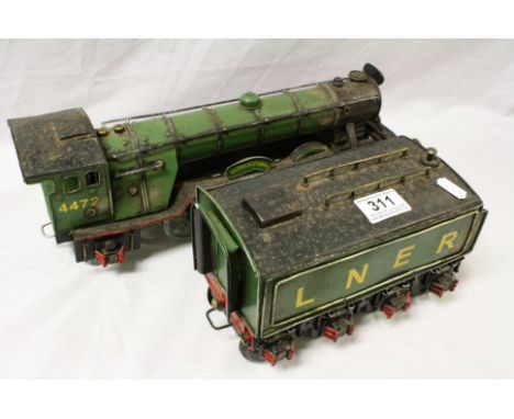 Tinplate model of an Engine marked "Flying Scotsman" with tender marked "LNER"