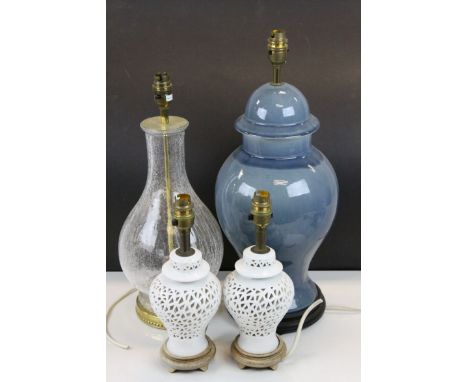 Blue ground ovoid ceramic lamp, glass crackle glazed lamp and two white ceramic lamps with pierced decoration 