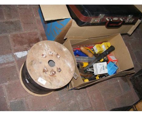 A reel of cable together with a box of various hand tools etc.