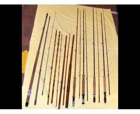 A Hardy Graphite rod and one other, together with other vintage fishing rods etc.