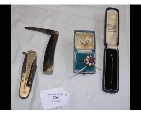 A ladies dress ring, together with a girl guides penknife, stick pin etc.