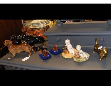Assorted ceramic Dachshund figures, including Royal Doulton and Wade  