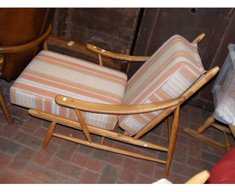A retro light Ercol easy chair
