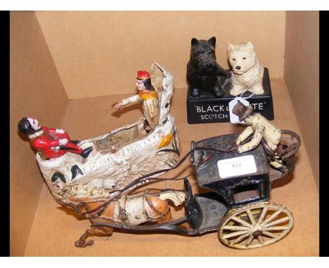 A Black &amp; White Scotch Whisky advertising figure, a 'World's Fair Bank', together with a cast iron figure of Hansom Cab 