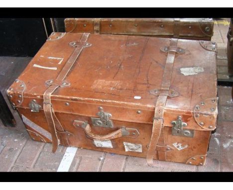 An old leather travelling trunk 