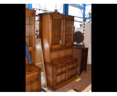 The matching Ercol side cabinet with glazed cupboards and fall flap - width 100cm 