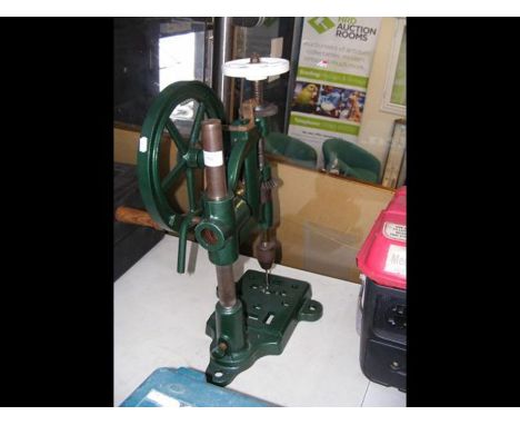 A vintage manual pillar drill