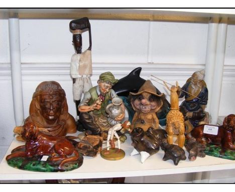 Two ceramic figures of hunting dogs, together with other figures 
