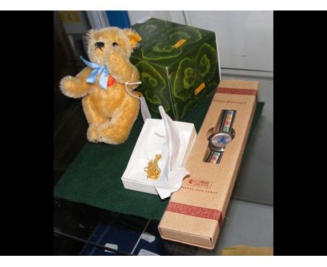 A miniature Steiff teddy bear together with collectable Steiff watch etc.