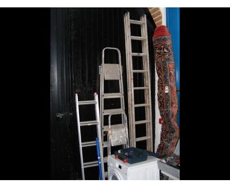 A 22 rung aluminum extending ladder, together with two step ladders
