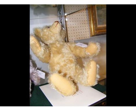 A collectable modern Steiff teddy bear with squeaker - 35cms with certificate