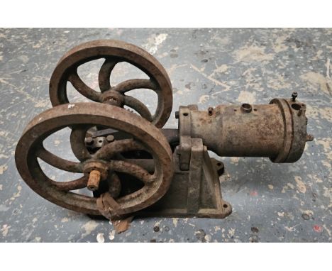 An incomplete horizontal stationary engine,&nbsp;flywheel 9", piston 3", overall length 17".