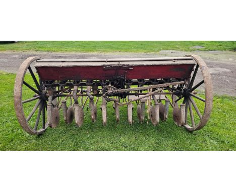 A Massey Harris No. seed drill, originally horse driven, complete and working order, unused for several years.Massey-Harris C