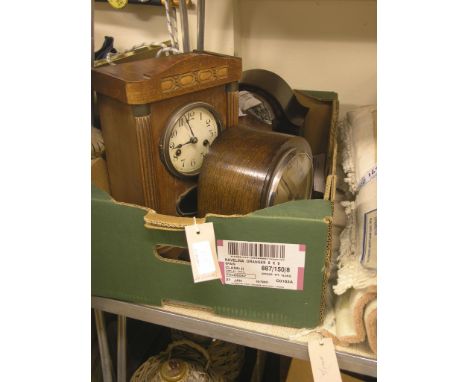 A walnut mantel clock and three other mantel clocks