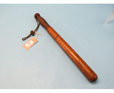 A police truncheon, probably Metropolitan, incised M P D beneath crown, 17.5in.