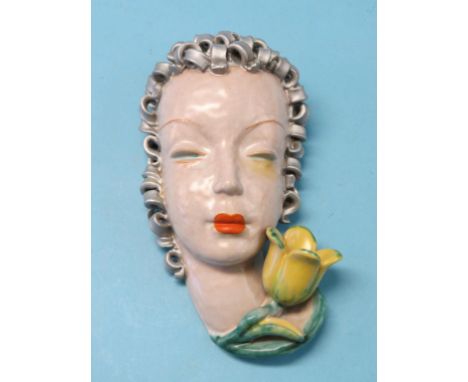 A Goldscheider Art Deco wall mask, young female with silver hair, printed mark and impressed no. 6859, 10in