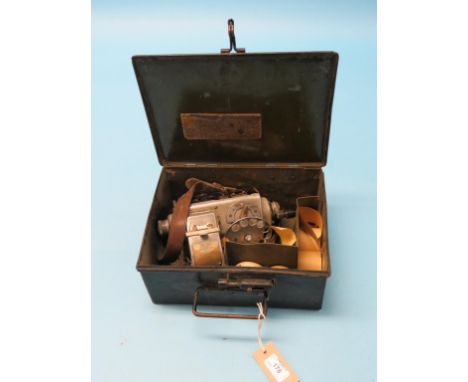 A bus conductor's ticket machine, with leather shoulder strap, in original tin case