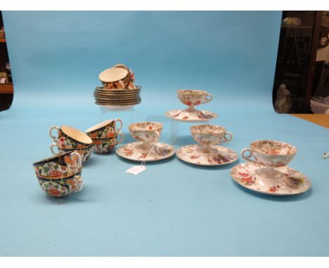 A set of four Royal Crown Derby tea cups and saucers, Japan pattern 6402, date-code 1899, one saucer repaired, and a set of f