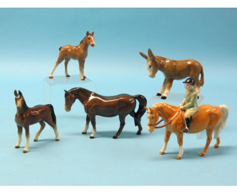 A Beswick jockey on horse, cap chipped, four other ceramic animals, Beswick Cats Collection moneybox and a blue and frosted g