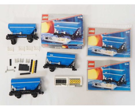 LEGO - TRAIN - A group of three #4536 Blue Hopper Car sets - one complete with instructions and box, plus parts and one set o