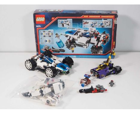 LEGO - SPACE - A pair of Space Police III sets comprising #5979 (mostly complete with printed instructions, boxed - missing 1