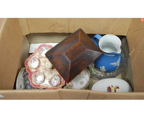 A box of miscellaneous items to include a Victorian porcelain egg-cup stand and cups and a Victorian tea caddy etc.