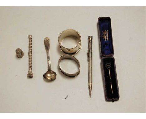 A silver cased propelling pencil by Sampson Mordan &amp; Co, having engine turned decoration; together with a silver napkin r