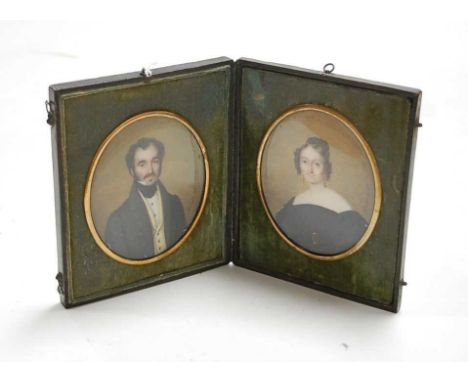 Adolphe Henri Dubasty (1814-1884) - a cased pair of portrait miniatures, being half-length studies of a lady and gentleman, h