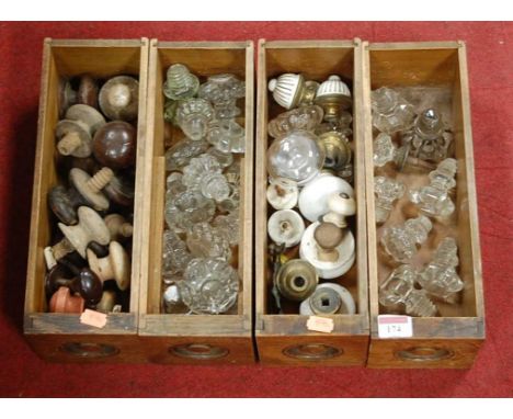 A collection of assorted Victorian and later ceramic, glass and turned wooden furniture knobs
