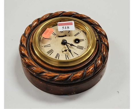 An early 20th century Ansonia Clock Company wall clock, having a painted dial with Arabic numerals and subsidiary seconds dia