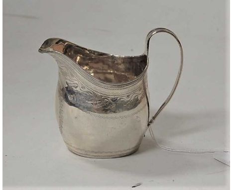 A late Georgian silver and engraved cream jug, of helmet form, 2.6oz, London 1808, h.10cmCondition report: Makers marks are t