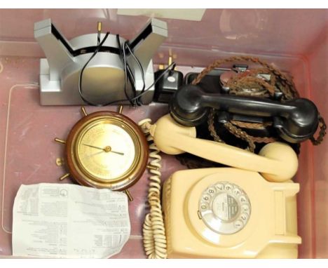 Two bakelite cased telephones; together with an LED Motion clock, and a modern barometer