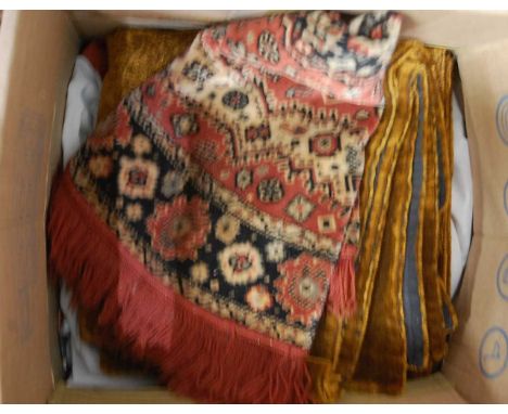 A pair of curtains; together with a small patterned rug; and a carved oak pelmet etc