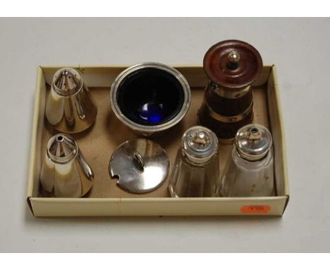 A mid-20th century oak and silver banded pepper grinder; together with a silver open salt with blue glass liner, a pair of si