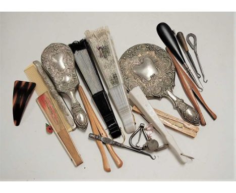 A collection of miscellaneous items, to include various fans, button hooks, glove-stretchers etc 