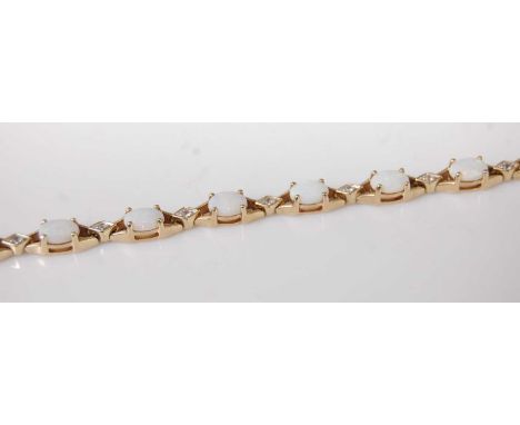 A modern 9ct gold, opal and diamond point set bracelet, 9.3g, 19cm