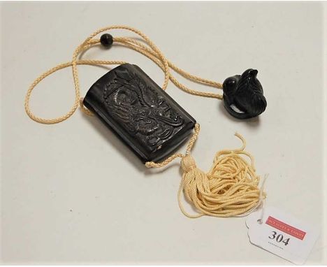 A Japanese carved wooden two-section inro, carved with a dragon, signed verso, the string with a carved netsuke in the form o