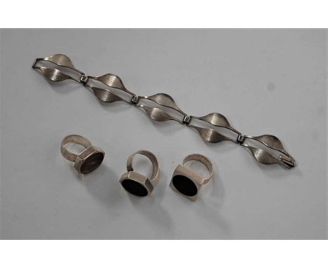 A vintage German 925 silver bracelet by Andreas Daum; together with three various silver and hardstone set modernist rings (4