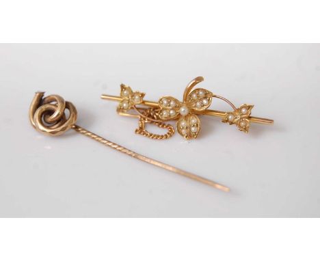 A 15ct gold seed pearl set bar brooch with safety chain, 2.5g, size 38mm; together with a yellow metal tie-pin, 1.8g (2)