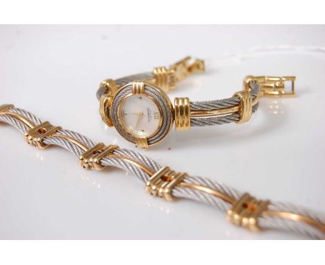 A Michelle Herbelin lady's bi-metal quartz wristwatch, having signed mother of pearl dial; together with a matching bracelet 