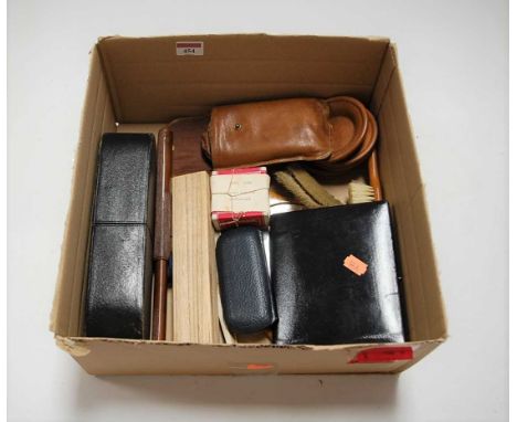 A box of miscellaneous items, to include various clothes brushes, photographic portrait of a lady, spectacles etc