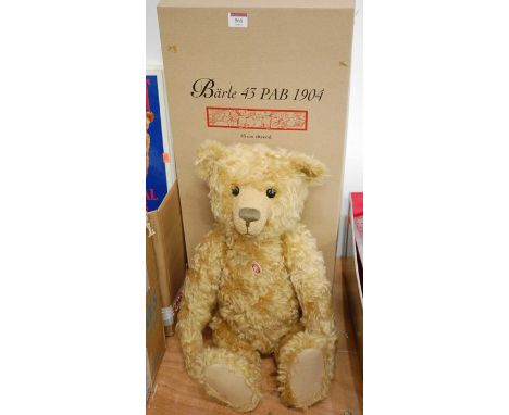 A large modern Steiff 1904 teddy-bear, in blond mohair, boxed, h.43cm