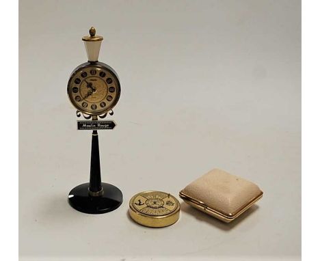 A novelty clock in the form of a Parisian street lamp, the clock with alarm, the lamp post with street sign for the Moulin Ro