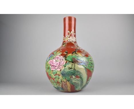 A 20th Century Chinese Bottle Vase Decorated in Relief with Peacocks and Flowers on Red Ground, Seal Mark to Base, 40cm high 