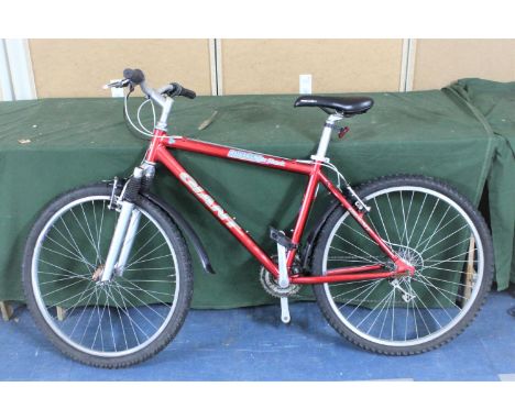 A Giant Boulder Alu Shock Bicycle 